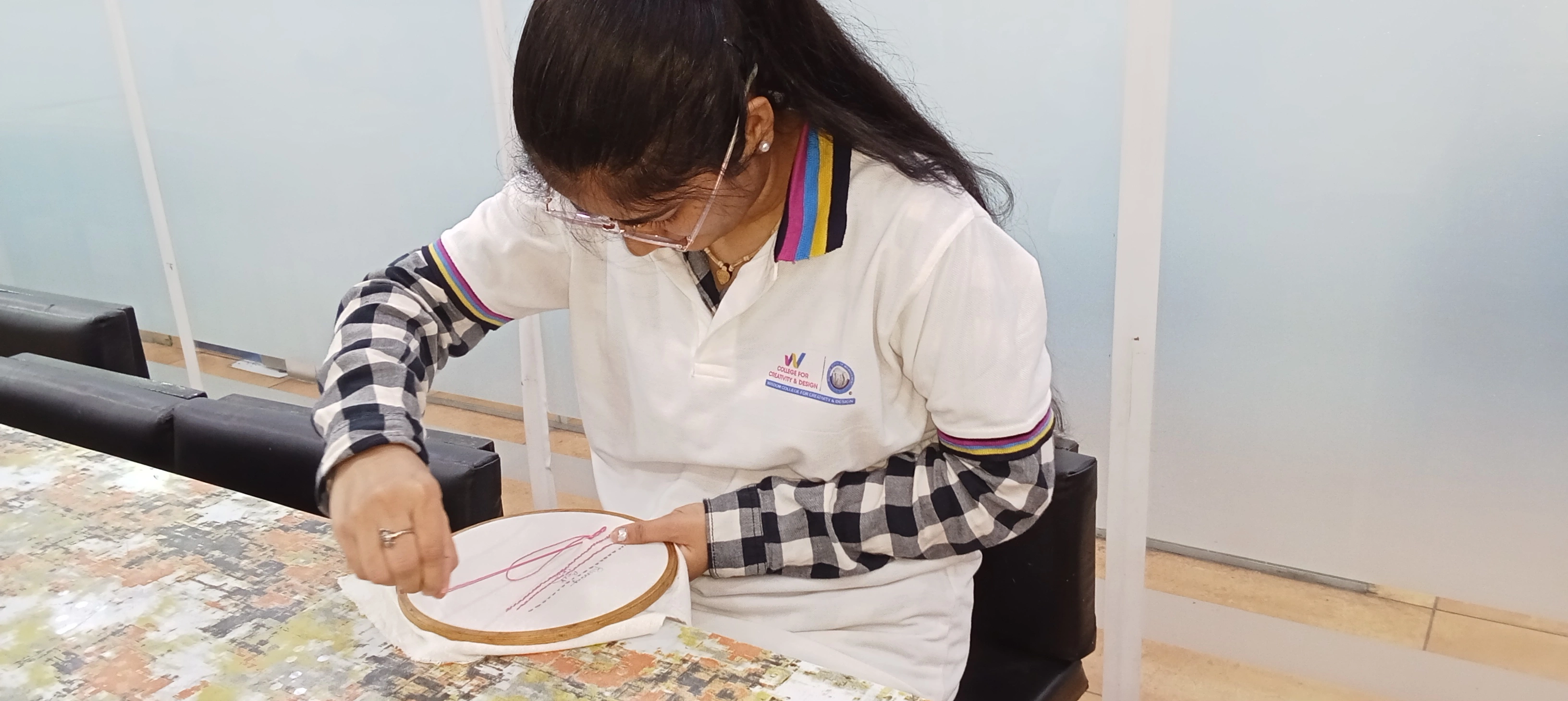 Foundation fashion design students sketching