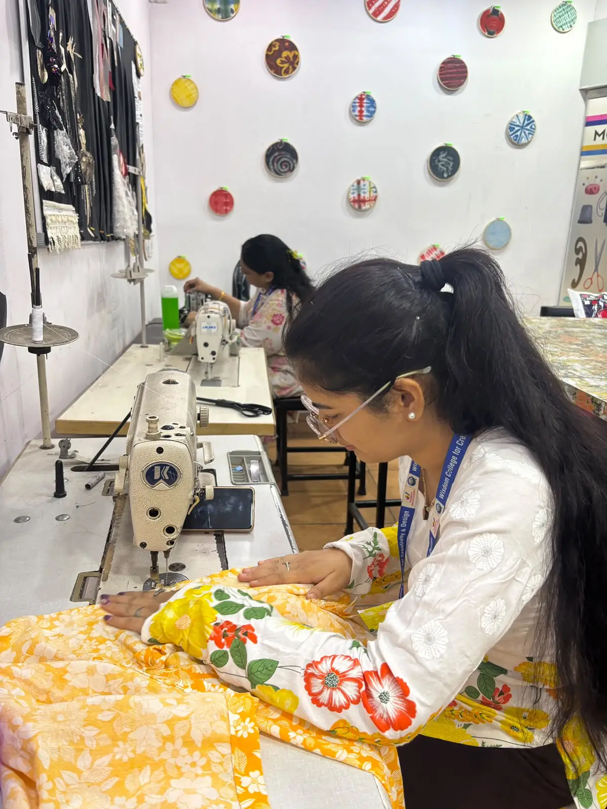Students working on pattern making table