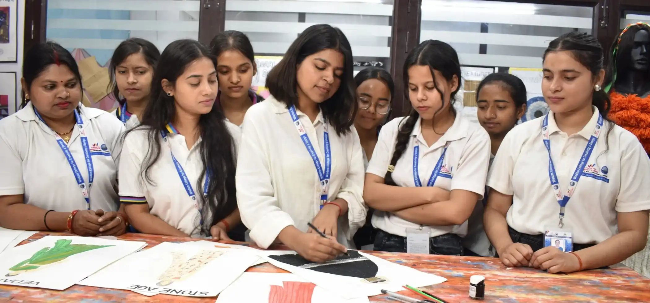 Foundation fashion design students sketching
